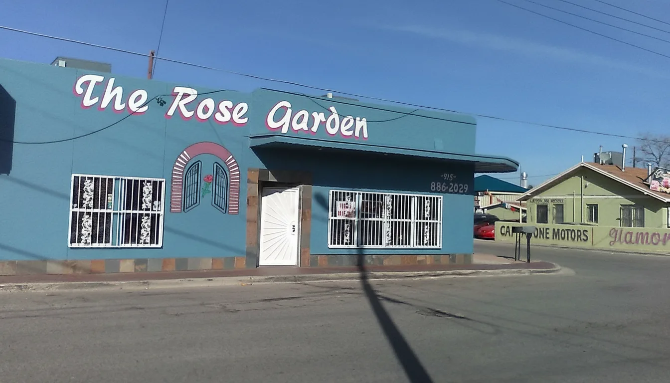 The turquoise building on Washington St with its painted sign